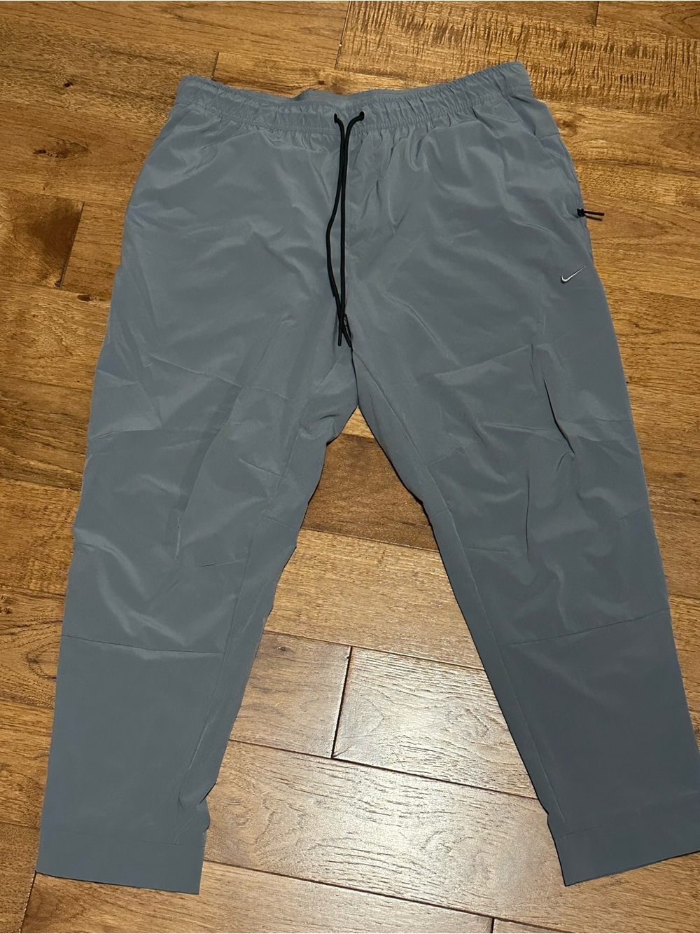Nike Dri Fit Men's Light Gray Performance Joggers with Black Drawcord